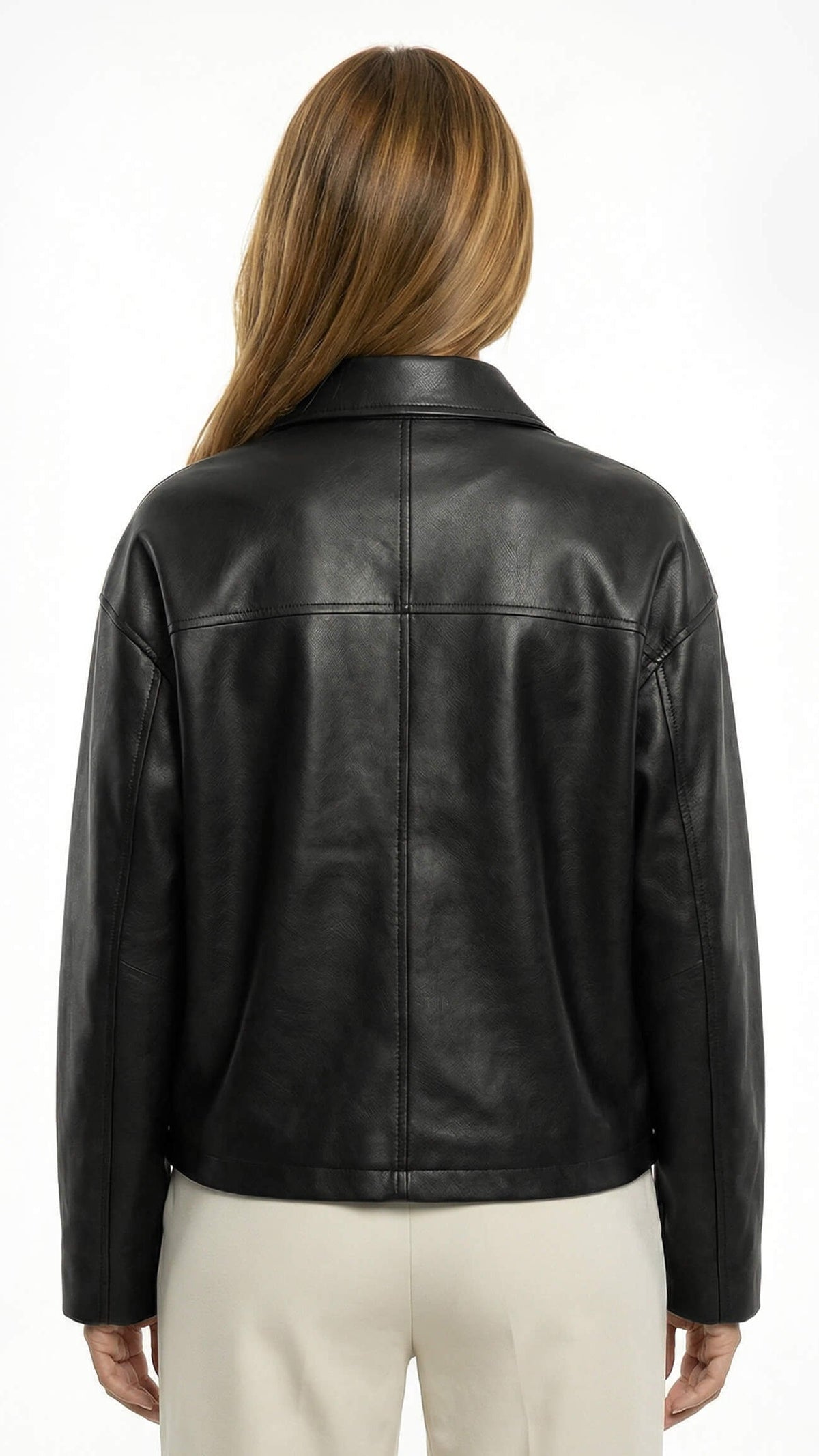 Black leather jacket worn by a person on a white backgroundBlack leather jacket on a white background - sfosh