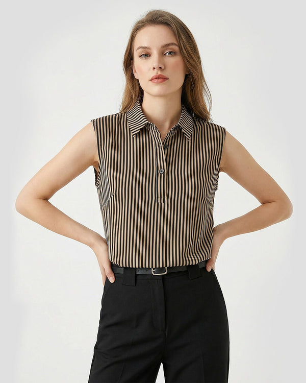 Woman wearing a sleeveless striped shirt and black pants on a white background- sfosh